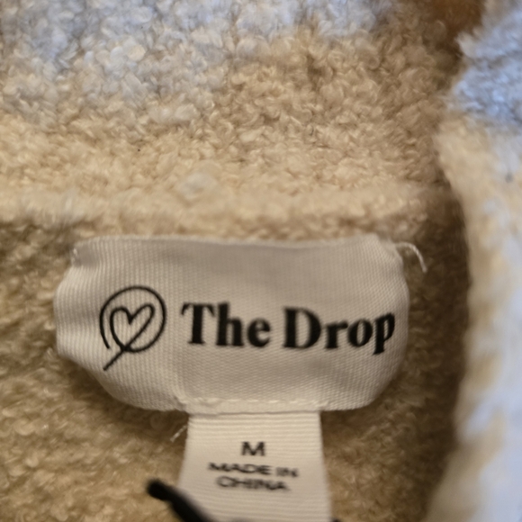 Elegant Black and Cream Striped Women's Turtleneck Sweater - Picture 3 of 7